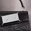 Snatched handbag small